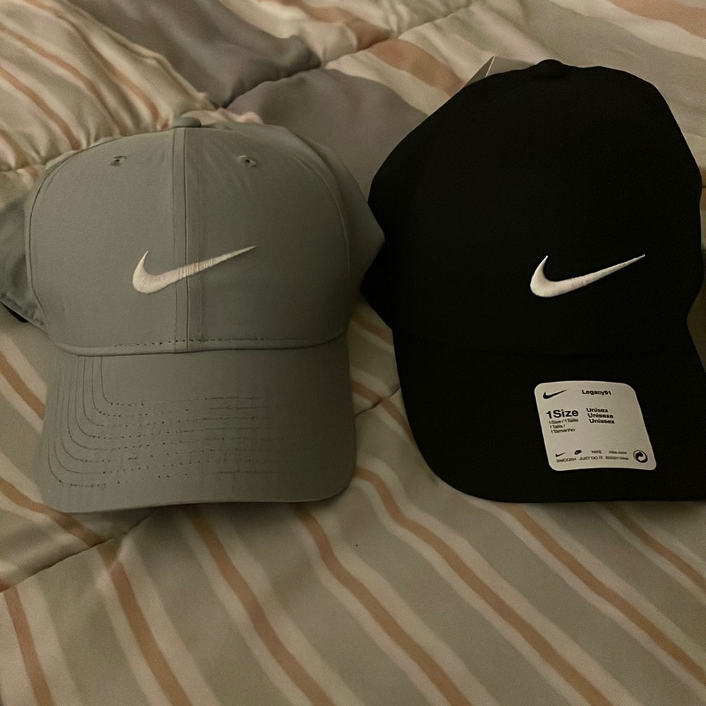 Pair of unisex Nike hats. Perfect for a jog or just a fun day with friends.